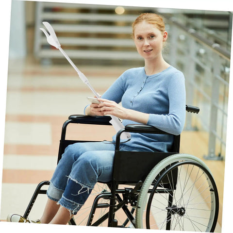 28 Inch Long Handle Grabber Reacher Tool for Seniors and Pregnant Women with Nonslip Grip, One Handed Operation, Lightweight Plastic and Stainless Steel Litter Picker for Easy Cleanup and Daily Independence, woman in wheelchair using it