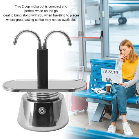 Stovetop Espresso Maker Real Deal Silver Stainless Steel Two Cup Italian Brew Pot With Dual Spout Handle on travel table.