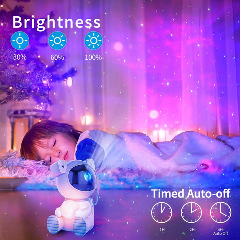 Child sleeping under Astronaut Galaxy Projector Night Light With Moon Lamp 7 Color Nebula Glow Remote Control And Auto Timer LED Galaxy Lamp