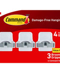 Damage Free Broom And Mop Holder Wall Mount With Three Grippers And Six Adhesive Strips on red packaging