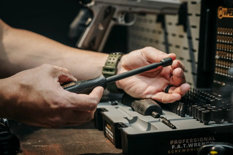 100 Piece Pro Fat Wrench Screwdriver Set With Durable Construction And Storage Case For Gunsmithing And Maintenance, Includes Metric And Standard Bits, Rubber Overmolded Handles, Non Slip Grip, Ergonomic Fixed Driver, Ready For Tightening. Used on firearm bench