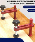 Beefy 20mm Woodworking Clamp Set with Red Protective Pads for Quick Setup, shown clamping a wooden board with adjustable positioning pins.