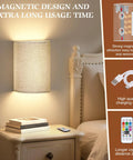 Wireless Rechargeable Wall Sconces Set Of Two Featuring 16 Rgb Hues And Three Warm Tones Delivering An Adjustable 1000 Lumen Glow That Gives Your Space Lowkey Vibes That Truly Slays on bedside table.