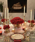 Elegant table setting with four Flameless Taper Candles With Remote And Timer 6 Pack LED Battery Operated Flickering Ivory Candlesticks