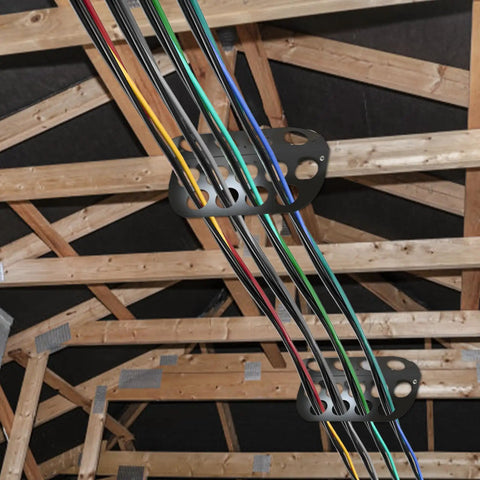 Hadwoer Cable Chase Wire Bracket 10 Pack NM Cable Organizer with 13 holes holding multiple cables securely in a wooden structure.