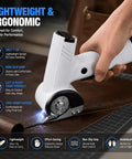 Hand holding the Built Tough Cordless Electric Cutter With 4V Motor And 3000mAh Battery, Rotary Shears cutting through brown leather.