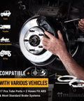 Hands using Pneumatic Brake Bleeder Kit With 2L Vacuum Pump And 1L Refilling Bottle One Person Brake Fluid Flush System on vehicle brake