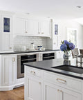 Modern white kitchen with Champagne Bronze Cabinet Pulls With Center Hole 5 Inch Length Modern Zinc Finger Handles on cabinets.