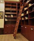 Library showing sliding barn door hardware kit with black carbon track system for library ladders, no ladder included, 13-foot track kit.
