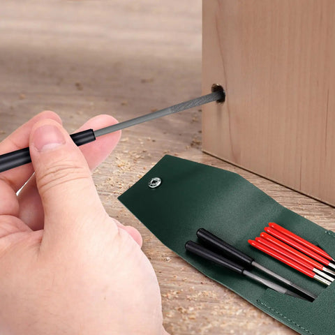 10 Piece Mini Needle File Set With Diamond And Steel Files in use on wood with synthetic leather case visible