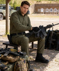 Man in tactical gear wearing Go-To Quick-Adjust Tactical Ratchet Belt For EDC CCW And Duty Use Heavy-Duty 1000D Nylon Belt in action