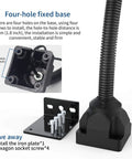 Close-up of built tough LED work light with flexible gooseneck, showing four-hole fixed base and mounting screws, IP65 waterproof.