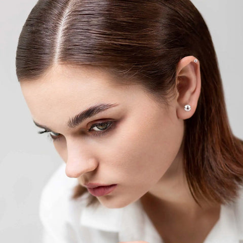 15 Pairs Ball Stud Earrings Set In 2mm 3mm 4mm 5mm 6mm Stainless Steel Silver Polished Studs For Men And Women Go-To Everyday Jewelry Multisize Surgical Steel Ball Earrings on ear model