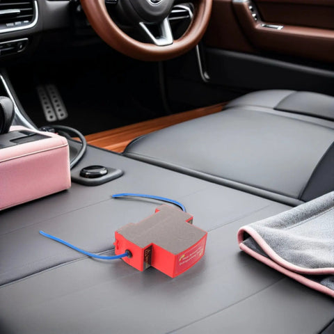 Heavy Duty Automatic Car Fire Extinguisher With Sticky Self Adhesive Patch For Quick Dash Install and Fast Engine Bay Fire Knockout in Rvs Trailers or Daily Driver Trucks on black car seat.