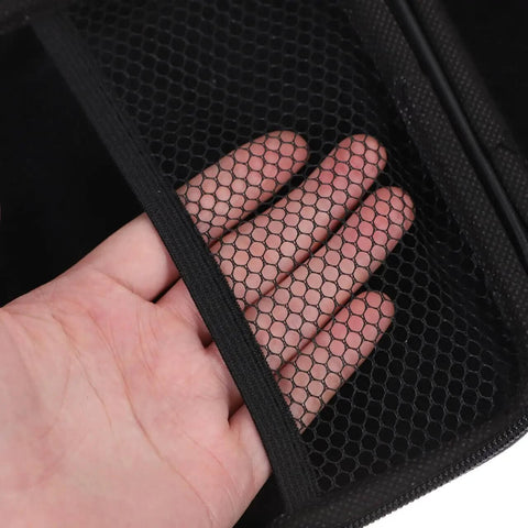Close-up of hand demonstrating the mesh pocket of Heavy Duty Hard Shell Tech Carry Pouch For Chargers Power Banks Cables And Earbuds With Water Resistant Cover And Secure Zipper For Daily Grinds And Weekend Wins.