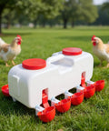 Backyard Boss Automatic Chicken Waterer Featuring Ten Heavy Duty Cups Plus A 9.6 Gallon Self Filling Reservoir on grass with chickens.