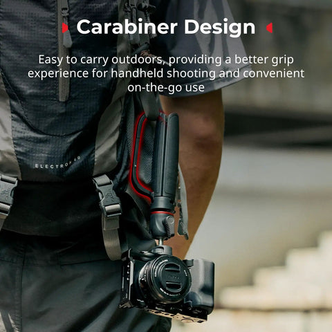 Versatile Extendable Mini Camera Tripod Selfie Stick With Carabiner Grip And Mantis Hook attached to backpack harness.