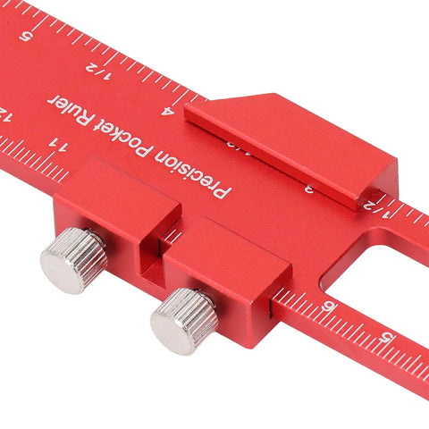 Close-up of a 6 Inch Woodworking Ruler With Adjustable Sliding Stop, Aluminum Alloy Pocket Ruler in red, showing engraved scales.