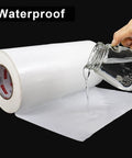 Pouring water over a roll of 12 Inch Wide Duct Tape Beefy Heavy Duty 9 Mil Industrial Grade Waterproof Tape 90 Feet Long Flexible No Residue White Tape