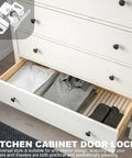 Push Release Magnetic Cabinet Latch With Double Wheel Spring Ball Bearing Door Catch on white dresser drawer