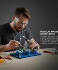 Man using Six Flexible Arms Magnetic Soldering Station With PCB Holders And Third Hand Tool for precision electronic repair.
