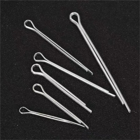 Assorted sizes of stainless steel cotter pins from the Stainless Steel U Cotter Pin Kit With 550 Pieces on black background.