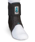 Person wearing Lace Up Ankle Stabilizer For Sprained Ankles And Peroneal Tendonitis Pro Grade All Day Comfort Orthopedic Ankle Support