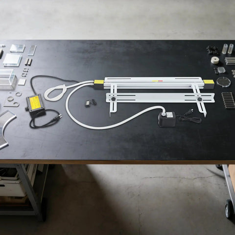 24 Inch 1000W Acrylic Heat Bending Machine With Water Cooling For Plexiglass Plastic on a workbench with various tools.