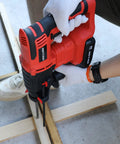 Person using Beast 18V SDS Plus Rotary Hammer Drill With Brushless Motor, 2.5J Impact Energy on wood, cordless design