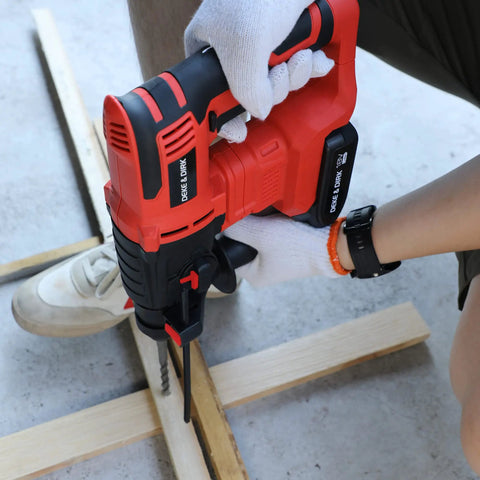 Person using Beast 18V SDS Plus Rotary Hammer Drill With Brushless Motor, 2.5J Impact Energy on wood, cordless design