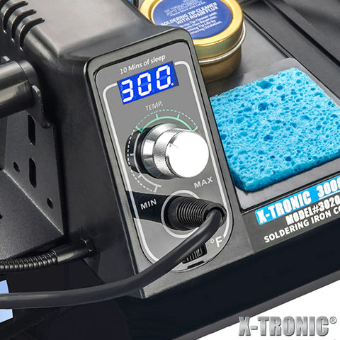 Close-up of 75W Soldering Station Kit with Quick Temp Digital Readout and sponge, showing 300°C setting.