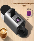 Compact Espresso Machine With 20 Bar Pump For Barista Grade Espresso One Touch Single Serve Coffee Maker Mystic Gray shown with coffee pod and cup