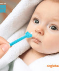 Baby with Baby Nose Cleaner And Ear Wax Removal Tool For Newborns Infants And Toddlers, using bear head design for boogers.
