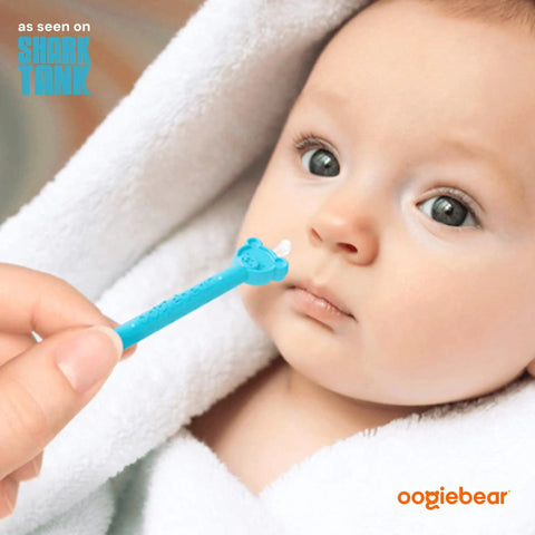 Baby with Baby Nose Cleaner And Ear Wax Removal Tool For Newborns Infants And Toddlers, using bear head design for boogers.