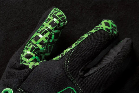 Close-up of Exo Grip Work Gloves For Men Black And Green Non Slip Silicone Fused Palm Sweat Wipe Terry Cloth Durable Heavy Duty Hand Protection In Size Large Pack Of 1; partial view showing black and green silicone patterns.