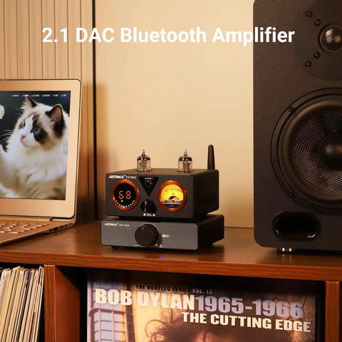 T9PRO 200W 2 1 Channel Tube Bluetooth DAC Stereo Amplifier on desk with tubes, display, and speaker beside laptop