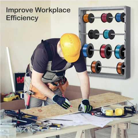 Heavy-Duty Wire Spool Rack Wall Mount With Four Adjustable 5/8 Inch Rods in workshop, holding multiple colored spools, gray steel.