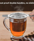 Stainless Steel Loose Leaf Tea Infuser With Extra Fine Mesh Ball Heat Proof Dual Handle Steeper in mug, large capacity strainer.