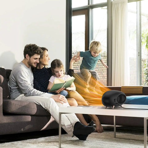 Family enjoying warmth from 600W Desk Heater With PTC Ceramic Tech in living room