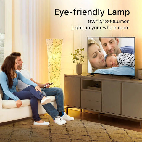Couple in living room with 61 Inch RGB Color Changing Floor Lamp With Marble Fabric Shade Remote Control Adjustable Brightness