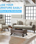 Effortless Home Move Sliders Two In One Heavy Duty Furniture Movers With Carpet Gliders And Plush Hard Floor Socks Multi Surface Moving Kit used on a sofa in a living room.