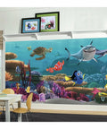 Disney Pixar Finding Nemo Peel And Stick Wall Mural featuring ocean scene in kids room, 10.5 ft x 6 ft mural with coral reef.
