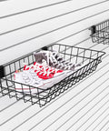 Four Pack Extra Large Slatwall Baskets For PVC Slatwall Panels Hanging Wire Storage Bins 24 By 12 By 4 Inches Ventilated Organizer Bins For Kitchen And Home Use showcasing black metal basket holding shoes on slatwall.