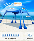 Beach Tent Sun Shelter 10x10ft Portable Shade Canopy UPF50 Sun Protection with sandbags and poles on a sunny beach