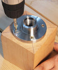 Heavy Duty 4 Inch Wood Lathe Face Plate With Compatible M33 M18 And 1 X 8 Tpi Threads Built Tough Steel Construction, mounted on wood block.