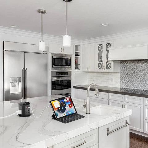 Pop Up Outlet With Wireless Charger And USB C Slick Retractable Recessed Power Station in modern kitchen with marble countertop