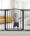 Extra Wide Baby Gate With Door For Doorways And Stairs Walk Through Swing Gate Pressure Mounted Tool Free Setup No Tools Needed Easy One Hand Operation Dual Direction Swing Fits 29 To 51 Inches with child behind it
