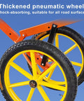 Heavy Duty Adjustable Lid Lifter Dolly With Air Ride Wheels And Rock Solid Clamps for Hauling Massive Stones showing thickened pneumatic wheels.