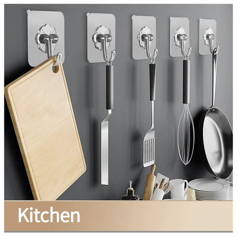 Heavy Duty Self Adhesive Hooks 27 Pack Up To 25 Lb Capacity Stainless Steel Sticky Hangers holding kitchen utensils