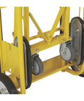 Close-up view of Heavy Duty Hand Truck 1200 Pound Capacity Appliance Dolly With Convertible Two Or Four Wheel Design, yellow frame.